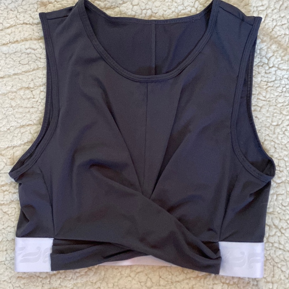Fabletics size medium cross body crop tank.